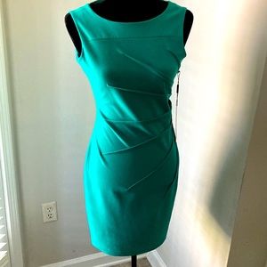 NEVER WORN! Beautiful Calvin Klein sunburst sheath dress. This is 4 petite size